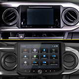 Before-and-after dashboard comparison showing the factory radio replaced by a Stinger touchscreen with source icons