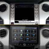 Toyota Tundra dashboard comparison showing the factory radio above the installed Stinger HORIZON10 touchscreen