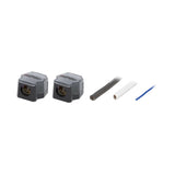 Angled view of two covered power distribution blocks with cable ends and a blue wire