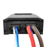 Close-up of a DS18 amplifier connection end with speaker leads and thick power cables attached