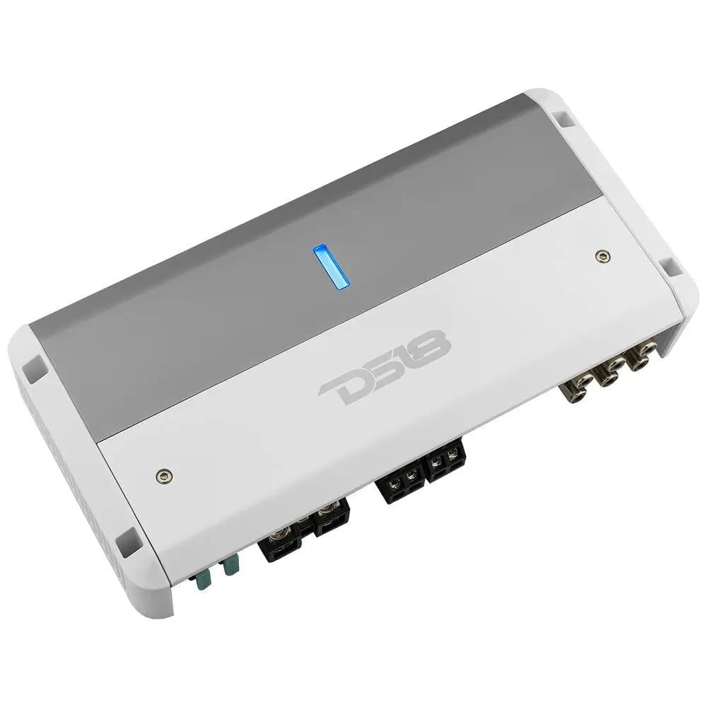 Angled top view of a silver and white DS18 amplifier with a blue indicator and terminals along one edge