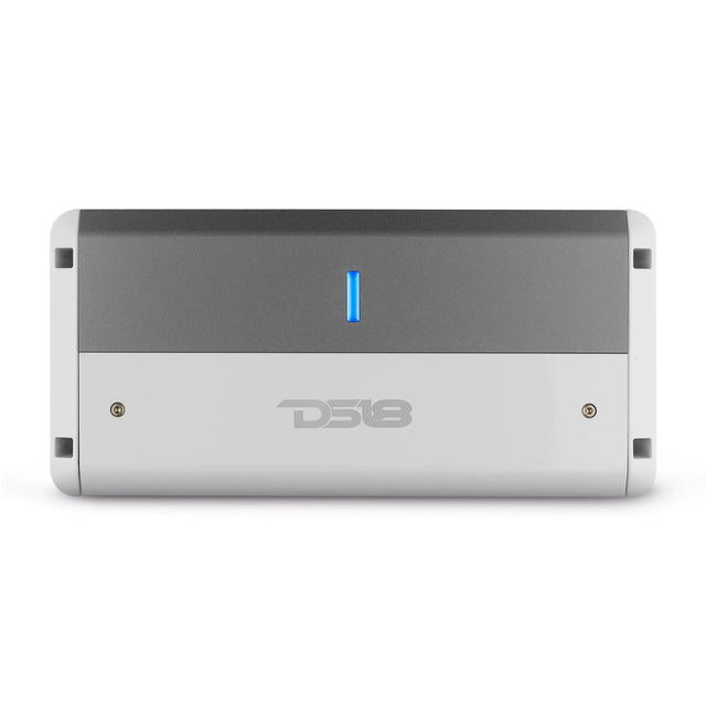 Top view of a silver and white DS18 amplifier with a blue indicator and smooth control cover