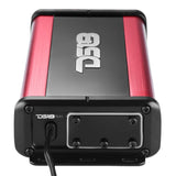 Angled view of a red-and-black DS18 amplifier with a screwed cover over its end-panel controls