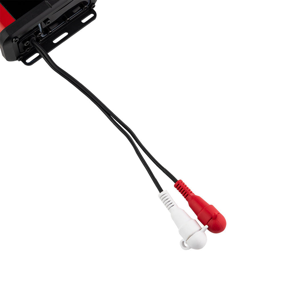 Close-up of an amplifier cable ending in red and white capped RCA connectors