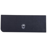 Rear view of a black carpeted VIBE subwoofer enclosure with a small specification label