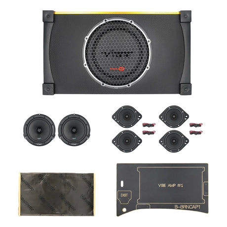 VIBE enclosure and speaker set laid out with mounting template, sound-treatment sheet and wiring hardware