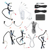 Axxess interface with wiring harnesses, white RCA cables, speaker adapters and black accessory leads