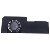 Straight-on view of a stepped carpeted enclosure with an offset VIBE subwoofer