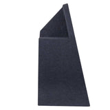 Side profile of a black carpeted subwoofer enclosure with a sloped upper section
