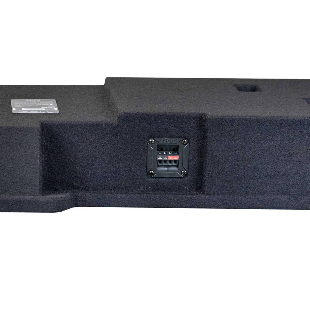 Close-up of a four-terminal connection cup in the recessed center of a carpeted enclosure