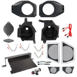 Speaker adapter pods, trim grilles, mounting tray, wiring and fuse hardware laid out for installation