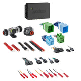 Axxess interface with blue and green wiring plugs, fuse holder, power terminals and small connectors