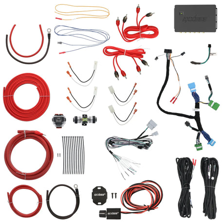 Vehicle audio wiring harnesses and power cables arranged beside an interface module
