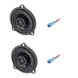Pair of black VIBE coaxial speakers with triangular mounting tabs and blue wiring connectors