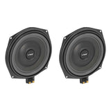 Angled front view of two black VIBE speakers with square mounting corners and lower terminals