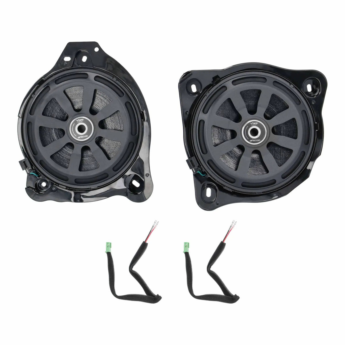 Front view of two shallow speakers with protective grilles and separate wiring adapters