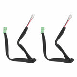 Two VIBE speaker adapter leads with green plugs and paired wire terminals