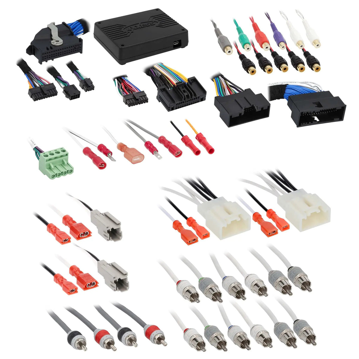 Audio interface, RCA leads and connector adapters laid out for a vehicle audio kit