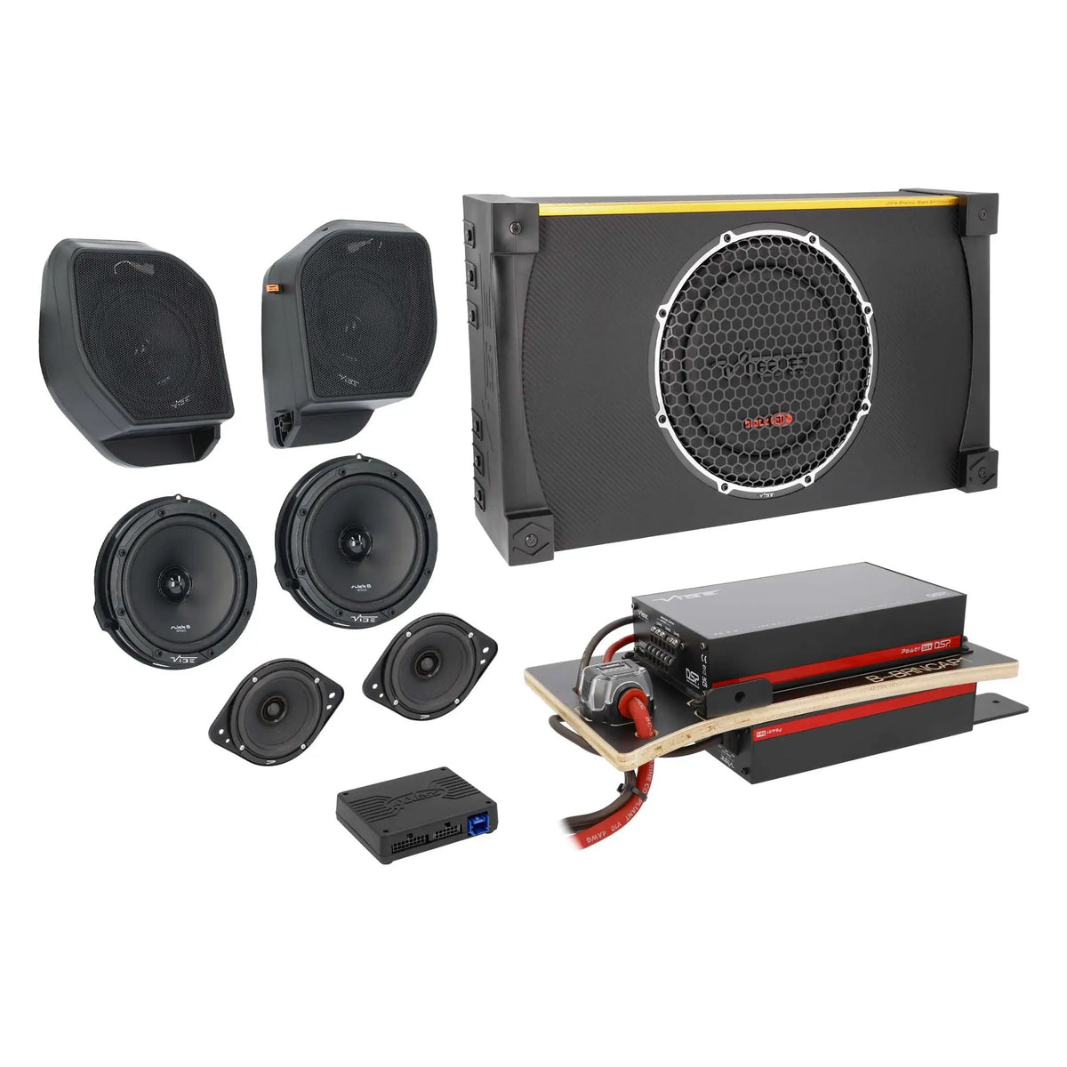 Angled view of a VIBE audio kit with a subwoofer enclosure, speakers, amplifier panel and Axxess interface